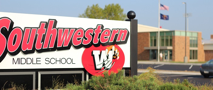 southwestern-middle-school-sign-in-foreground-with-building-in-background